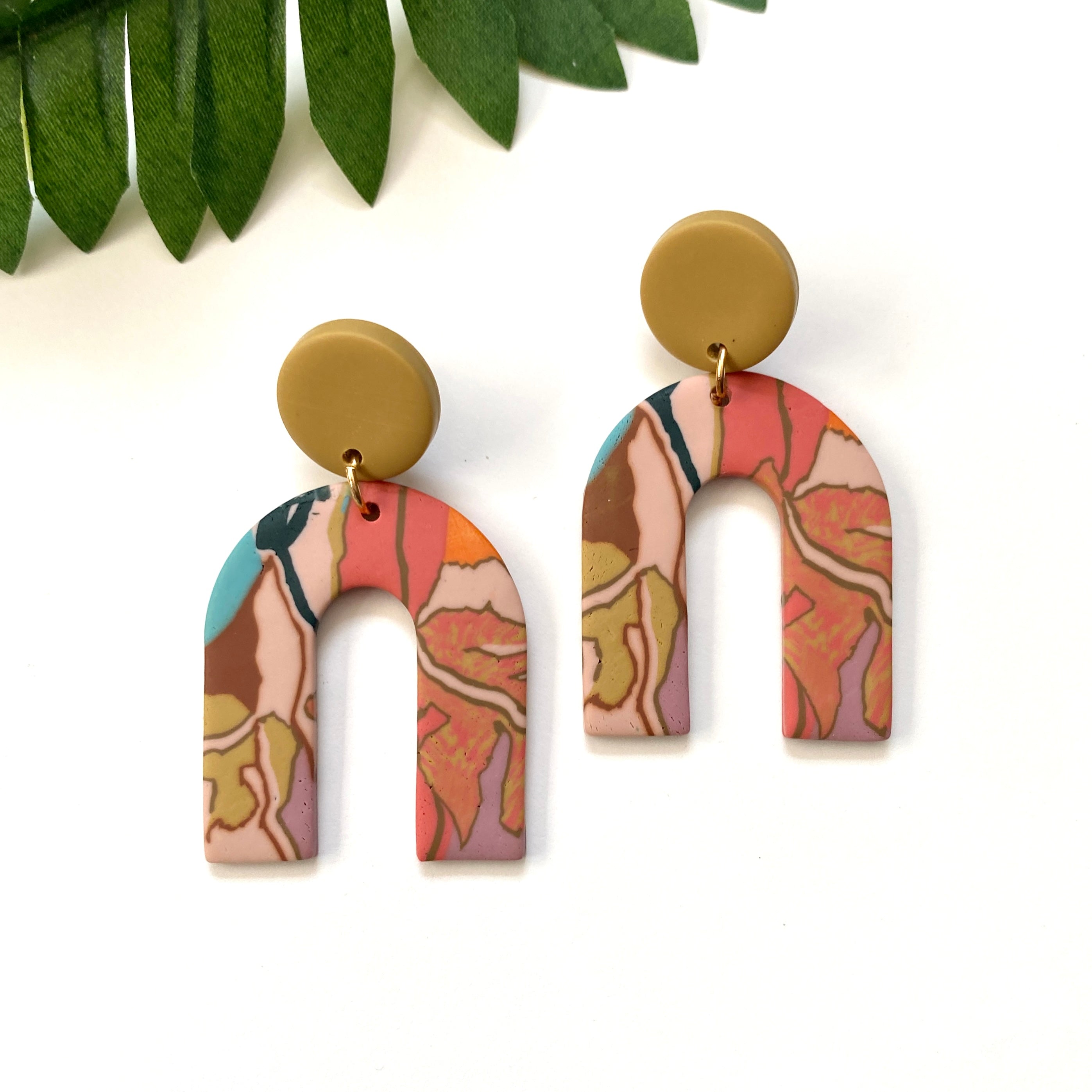 “Falling For You” Arch Earrings